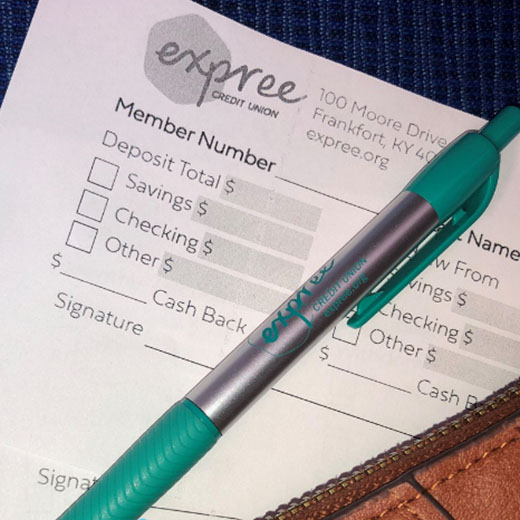 Expree deposit slip and pen