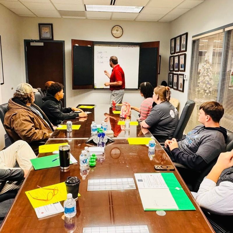 Young couple planning in their new home