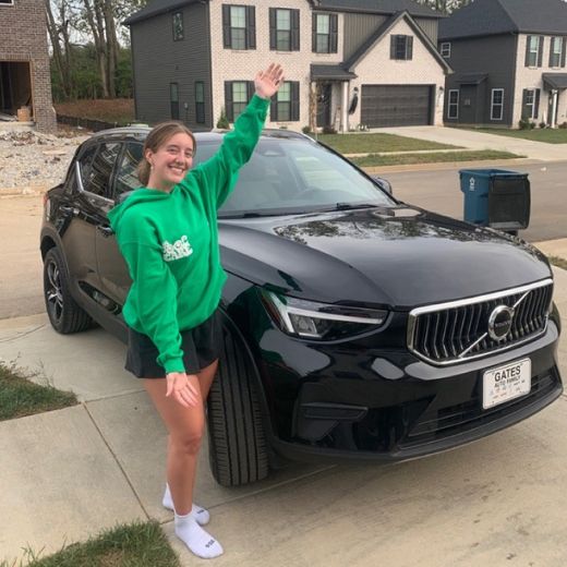 Expree loan office handing keys to new car owner