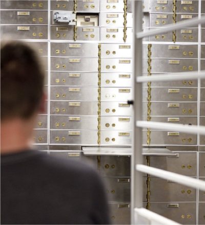 Customer in safe-deposit box room